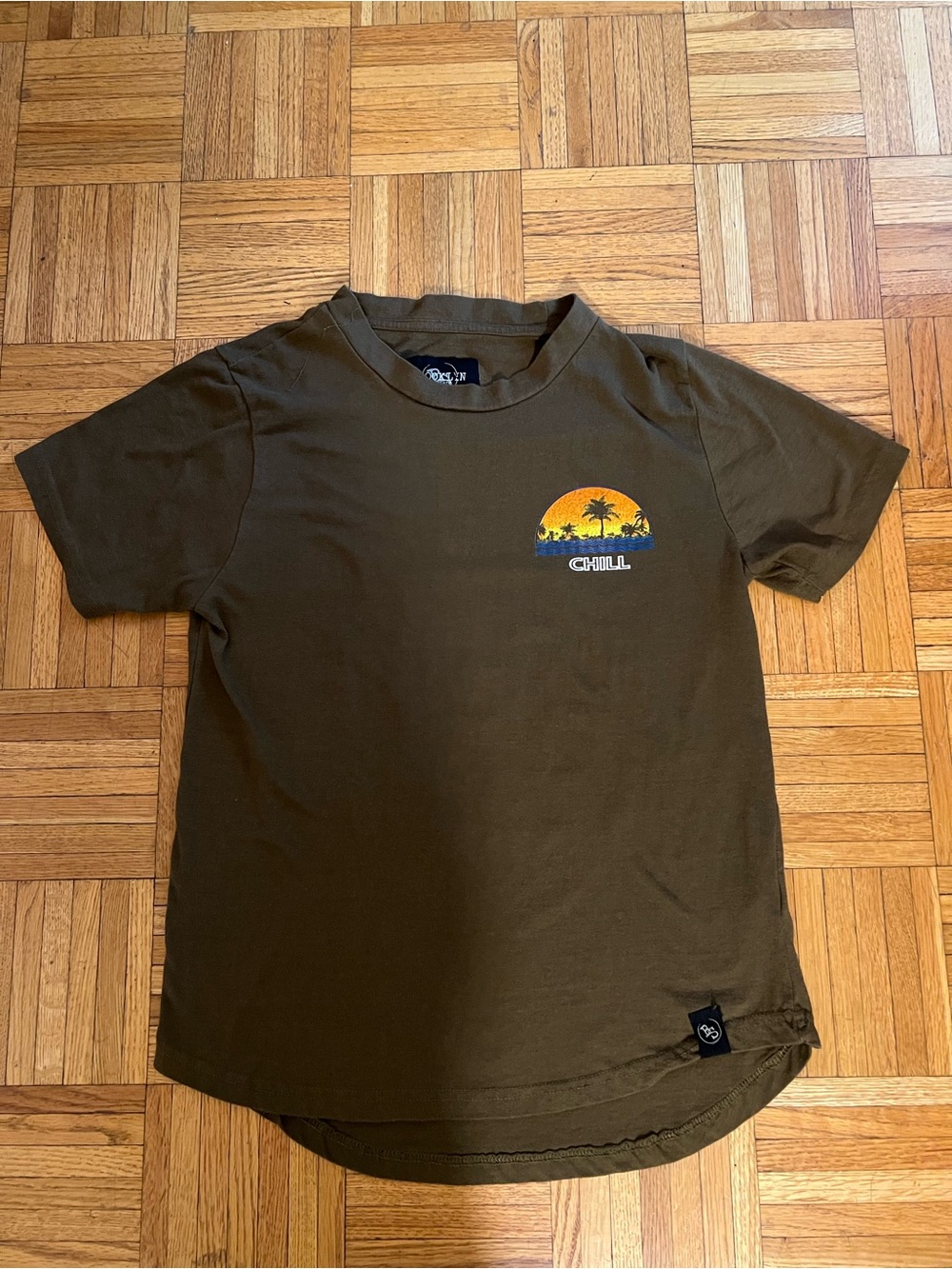 Brooklyn Standard Brown Tee with “Chill”Chest Graphic and “Relax” on back